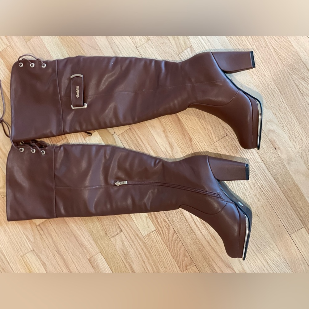 New! Brown thigh high fashion boots.